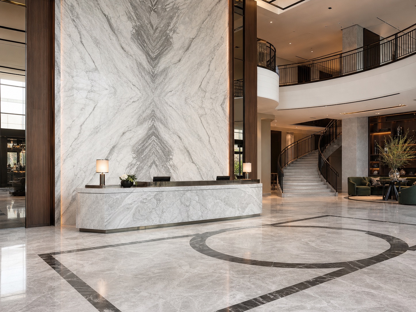 Luxury hotel lobby with book-matched marble wall and custom stone reception desk